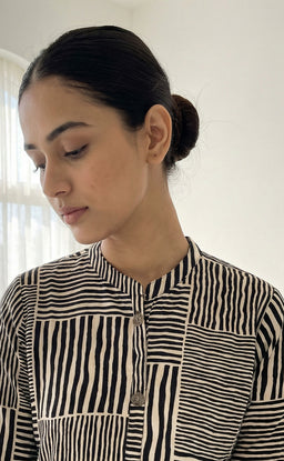 Base Cream Modal Zebra printed button work Flair kurti