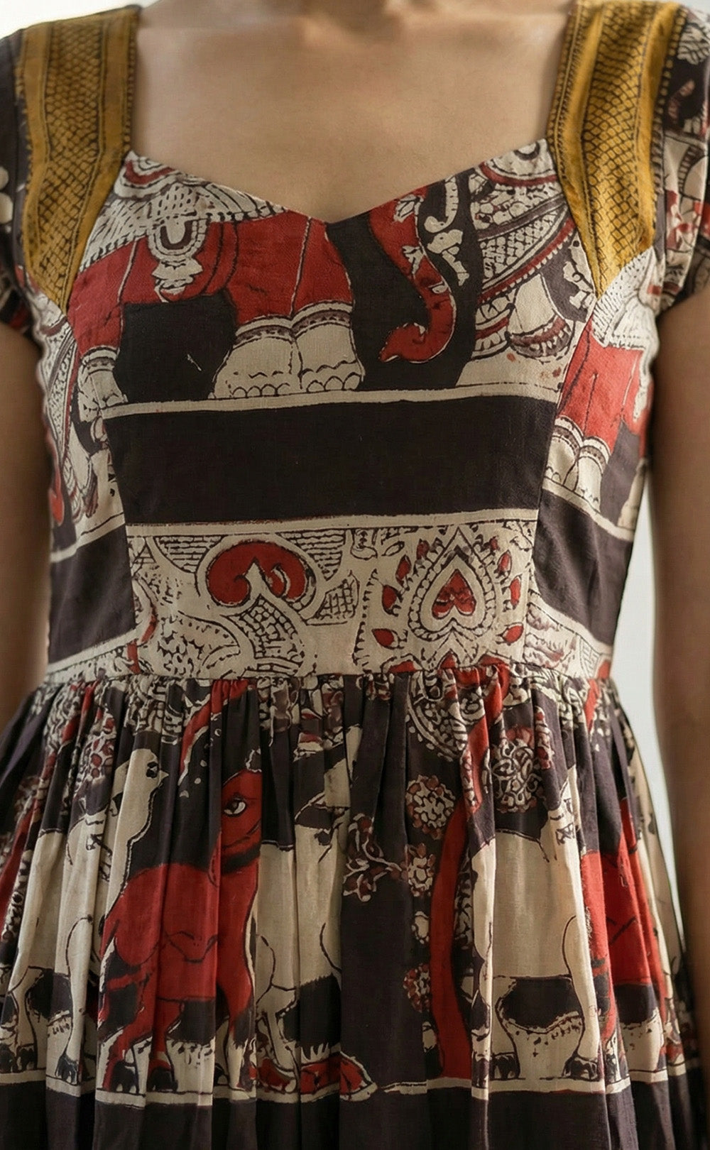 Masriser Black Kalamkari panel printed kurti Gown with contrast Golden Border work