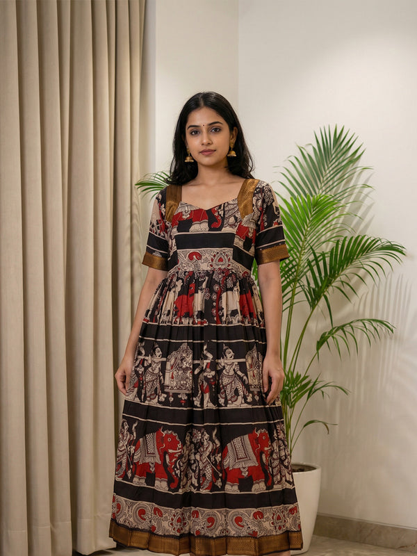 Masriser Black Kalamkari Panel printed Kurti Gown with contrast Golden Border work