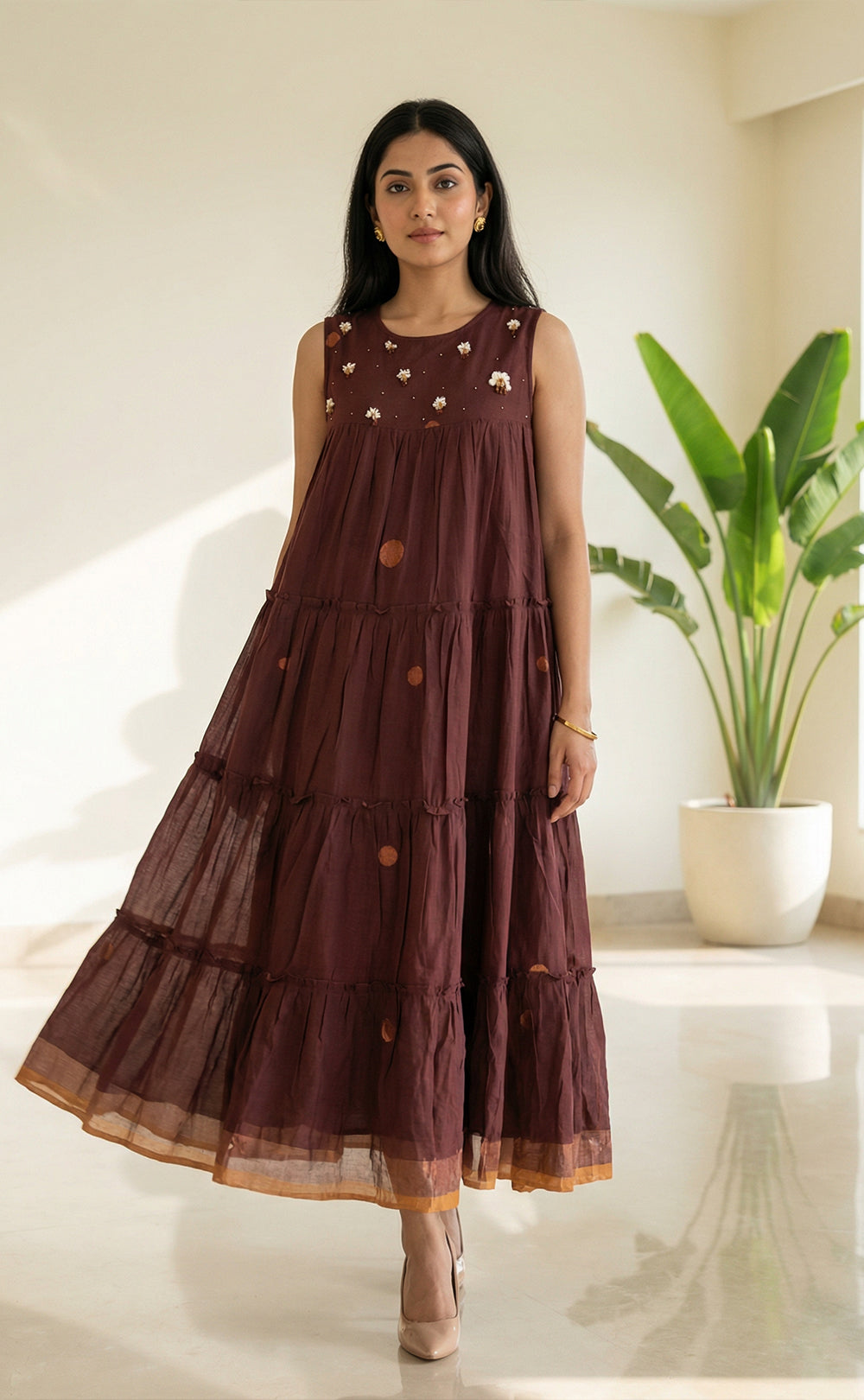 Woman wearing a brown tiered dress